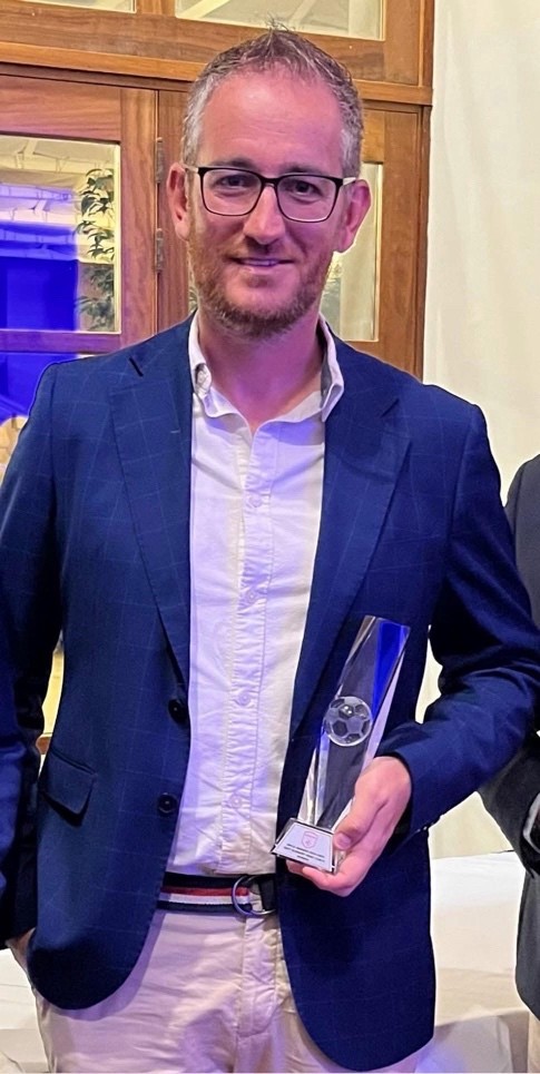 Maltese coach Etienne Vella with the Malta Head Coach of the Year award for 2024/2025