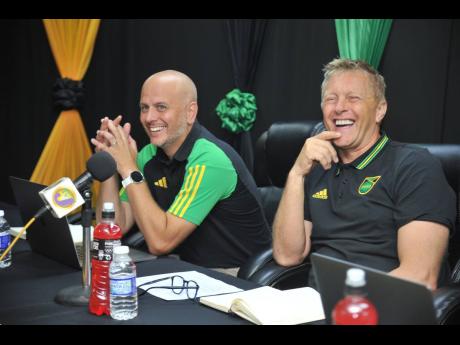 John Wall (L) and Heimir Hallgrímsson (R) at a press conference