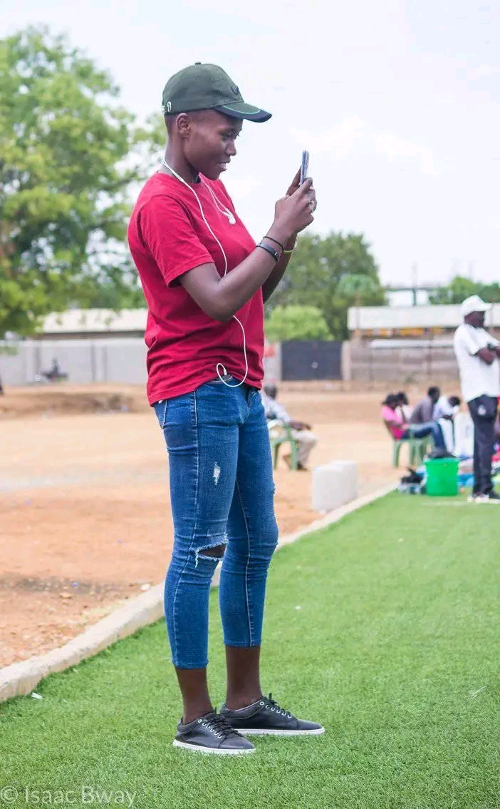 Munuki goalkeeper Soga Grace 'Dia Sisi' filming a match in South Sudan