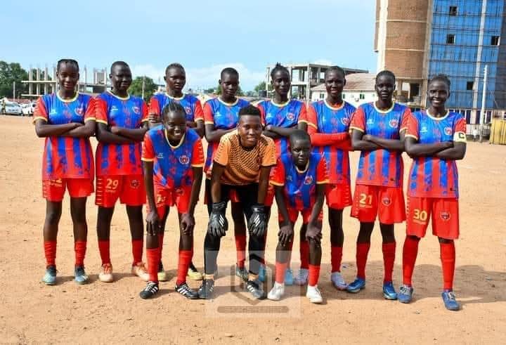 Munuki goalkeeper Soga Grace 'Dia Sisi' and the Munuki Women team before a match
